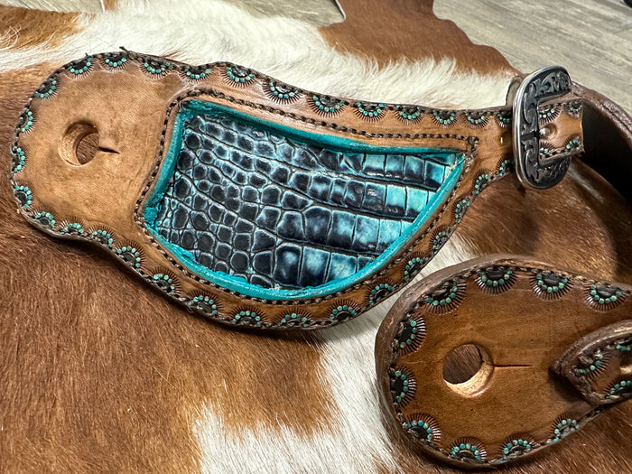 Hand tooled and painted spur straps with your custom wording stamped