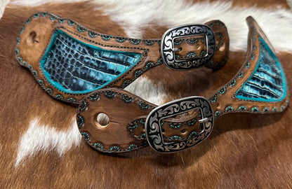 Hand tooled and painted spur straps with your custom wording stamped