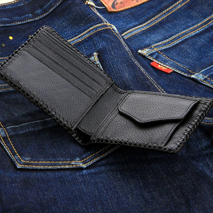 The open interior of the men's black leather wallet, showing the card slots and secure coin pocket.
