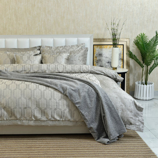 Charcoal gray duvet cover set with geometric damask design and layered coordinating shams