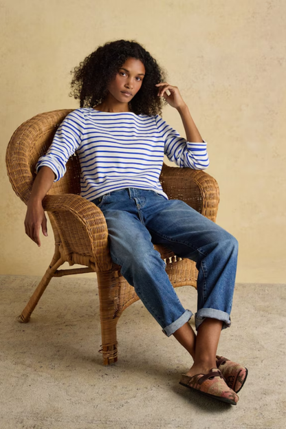Shop the Joules Harbour blue and white stripe boat neck top — a heritage-inspired relaxed fit in soft cotton jersey, perfect for everyday styling with dresses, jeans or chinos.