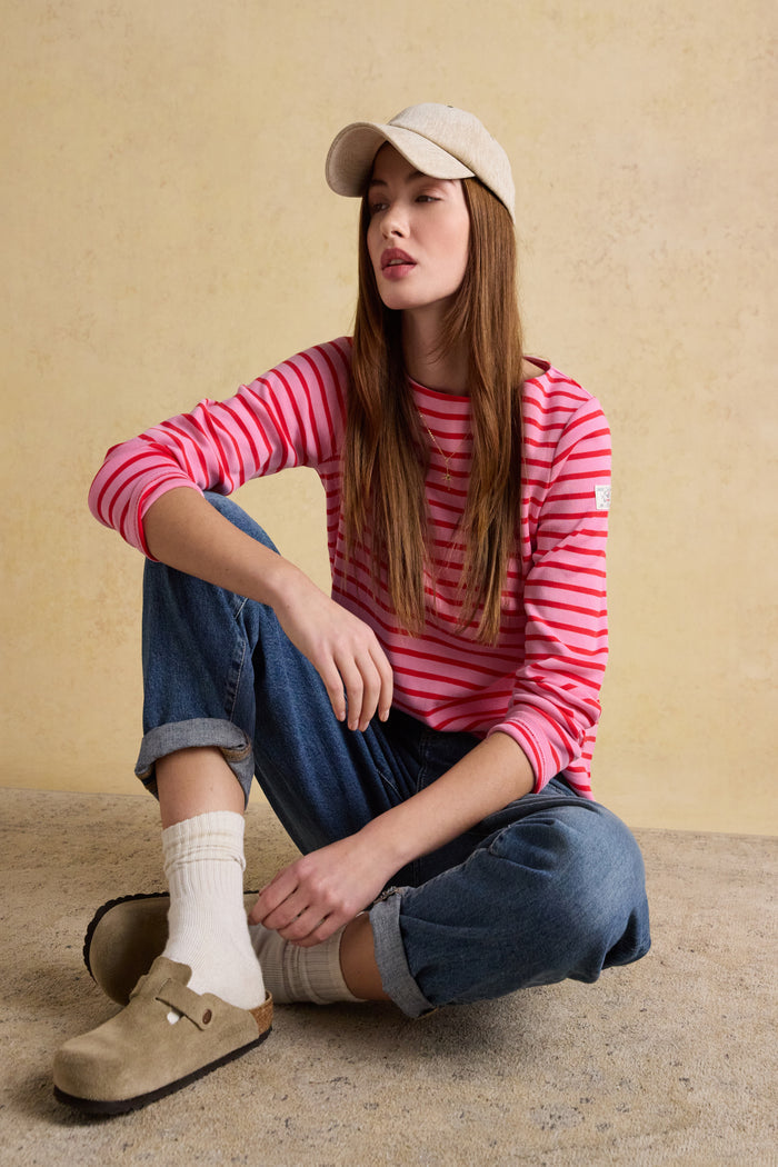 A timeless classic with a fresh pop of colour, the Joules Harbour Breton top in pink and red stripe is one of those pieces that never dates. Shop Joules at Dotique.