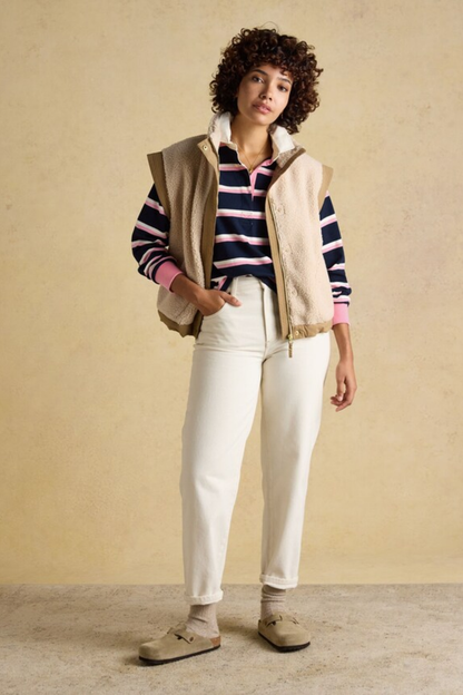 Model wearing Joules W30854 Lara Rugby Shirt – Navy / Pink Stripe by Joules, shop Joules at Dotique.