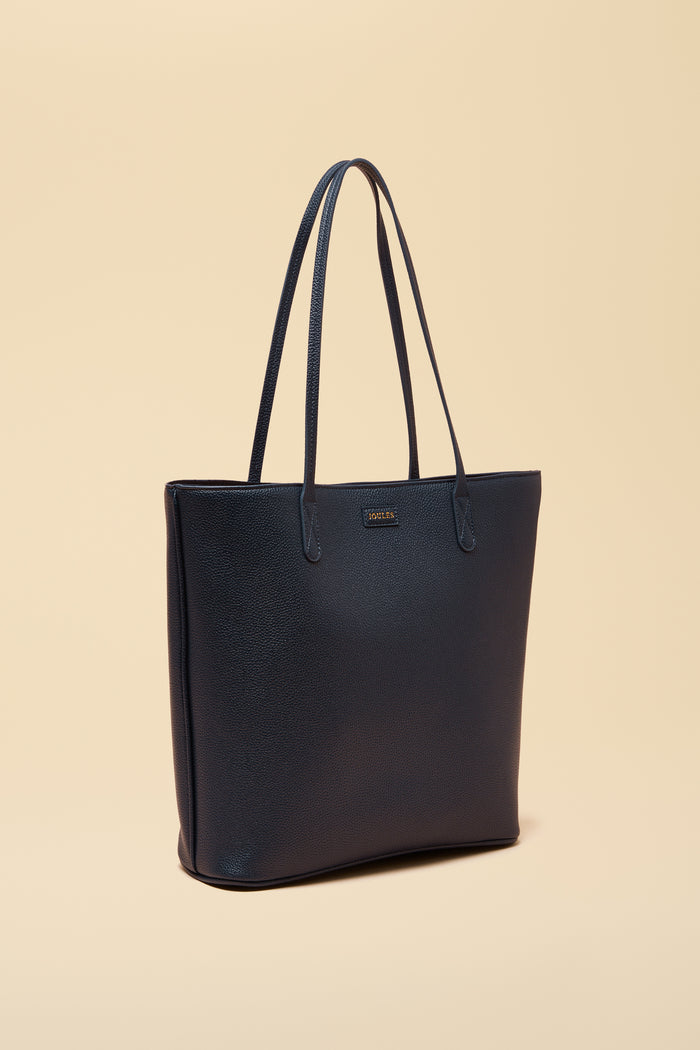Shop Joules at Dotique for colourful, feel-good womenswear. From everyday Breton tops to cosy fleeces and dresses, discover timeless British style. Shop Joules Jemima Navy Shopper bag at Dotique.