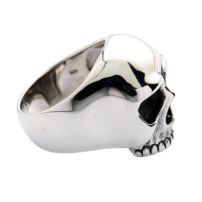 Side view revealing the smooth polished interior band and .925 hallmark stamp inside the skull ring