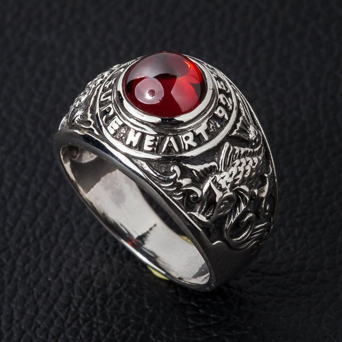 Koi fish signet ring showing treasure heart 925 inscription around red stone