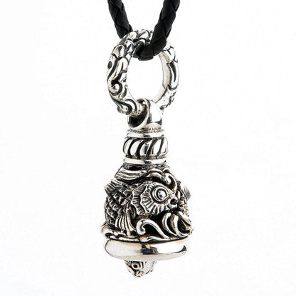 Sterling silver Koi Guardian Bell pendant showing detailed fish scales and face on braided leather cord