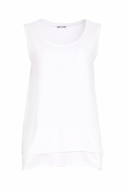 White Naya cami top with wide straps, layered raw hem and back vent. Soft, flattering and perfect for layering. Shop at Dotique.