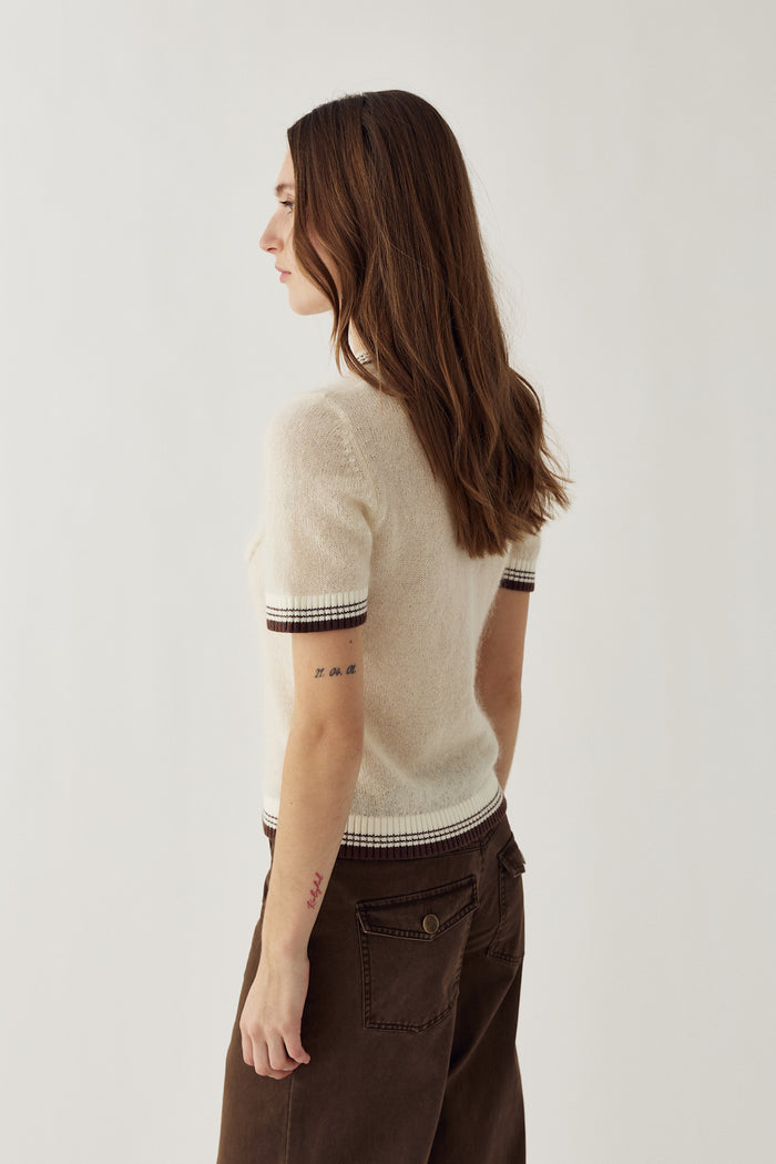 Model styled in Noella N-Marthy Knit Ivory Brown by Noella. Shop Noella at Dotique