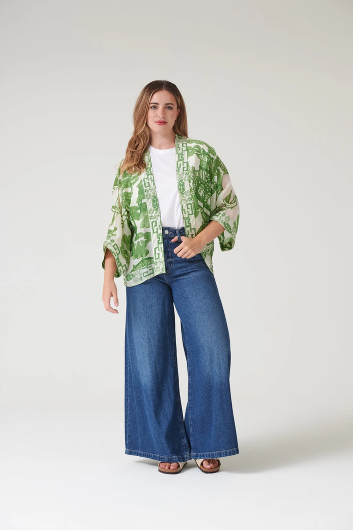 Giant Willow Green kimono by One Hundred Stars in a premium modal-cupro blend. Lightweight, fluid and perfect for layering over dresses, tops or swimwear. Shop at Dotique.
