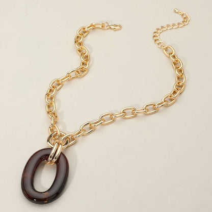 Oval Ring Pendant: Brn