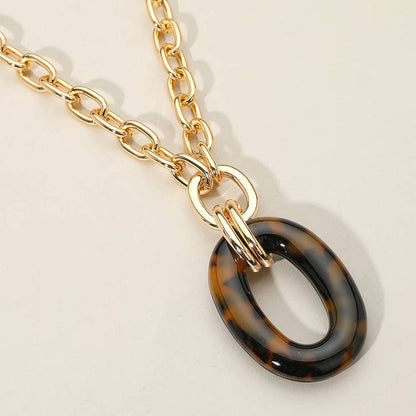 Oval Ring Pendant: Brn