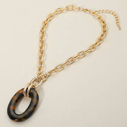 Oval Ring Pendant: Brn