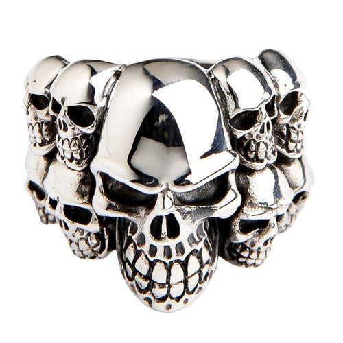 Front view of the phantom skull biker ring featuring eleven skulls crafted from sterling silver.