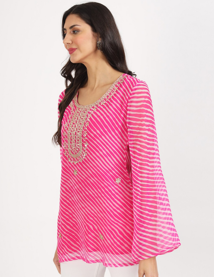Vibrant pink and white georgette leheriya short kurti for casual and semi-formal wear.