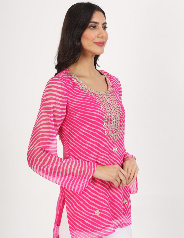 Vibrant pink and white georgette leheriya short kurti for casual and semi-formal wear.