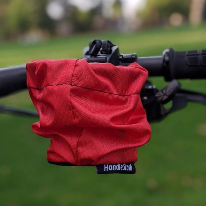 Cover photo of red hot HandleStash cup holder with no drink.