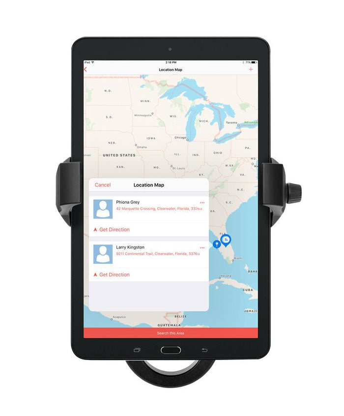 A RoadVise® Ultra Holder with Aluminum Handlebar Mount secures a tablet showing a southeastern US map with two Florida markers, while a wireless charging phone mount nearby enables convenient navigation and address access for smooth travel.
