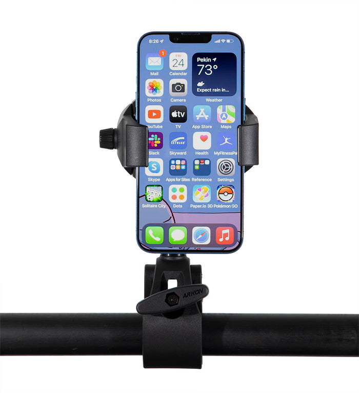 A smartphone is secured in the RoadVise® Ultra Holder with Multi-Angle Arm and Clamp Mount, displaying its home screen with app icons and a weather widget, against a white background.