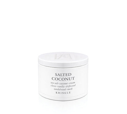 Kringle Candle tin labeled 'Salted Coconut' on a white background