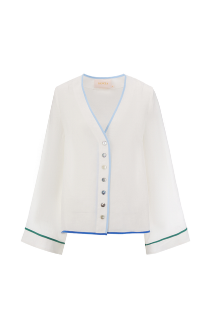 Relaxed, lightweight cupro shirt by Sancia with wide sleeves and shell buttons. Soft, floaty and easy to style for summer. Shop at Dotique.