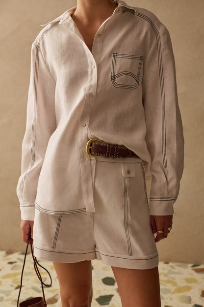 Ivory shirt by Sancia with contrast stitching and a relaxed fit. Lightweight, easy to wear and perfect for everyday styling. Shop now at Dotique.
