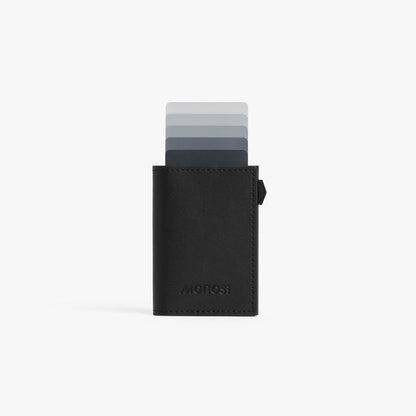 Carbon Black / Black | Front view of Slim Wallet Pro with cards in Carbon Black / Black