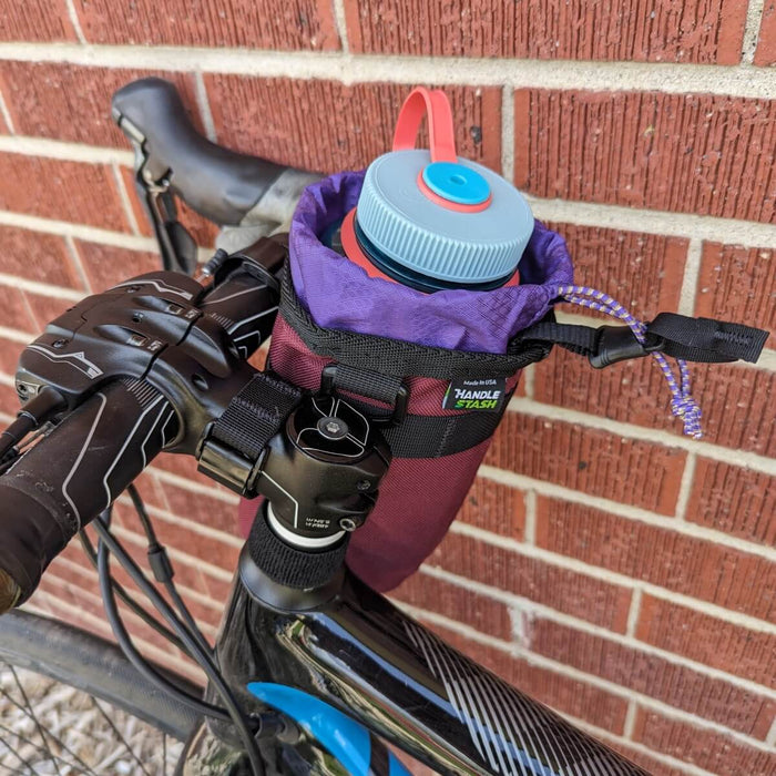 Stem bag with nalgene on bike.
