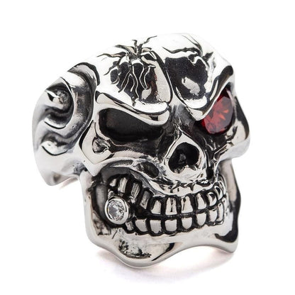 Side profile of the cracked skull ring showing the polished 925 sterling silver band and flame details.