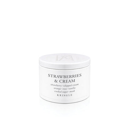 Kringle Candle 'Strawberries & Cream' scent in a tin container on a white background