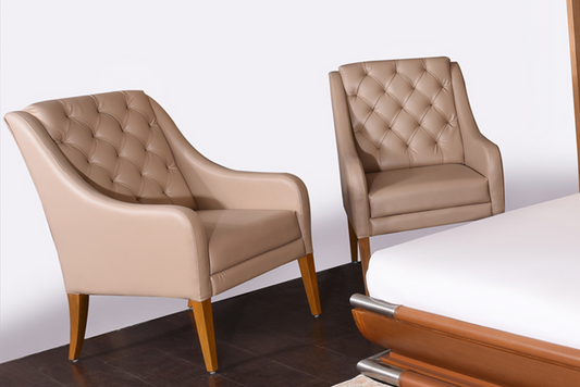 Tufted upholstered accent chair, beige/tan leather-look with wooden legs, pair