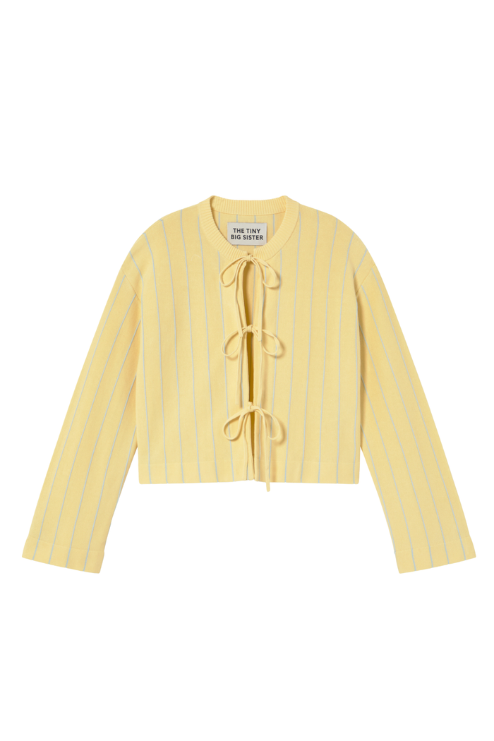 Tiny Big Sister striped cotton cardigan with tie front detail in a soft yellow tone. Light, flattering and perfect for layering. Shop at Dotique.