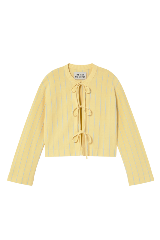 Tiny Big Sister striped cotton cardigan with tie front detail in a soft yellow tone. Light, flattering and perfect for layering. Shop at Dotique.