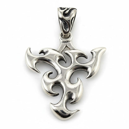 The sterling silver frame of the guitar pick holder shown by itself, highlighting the tribal flame carvings.