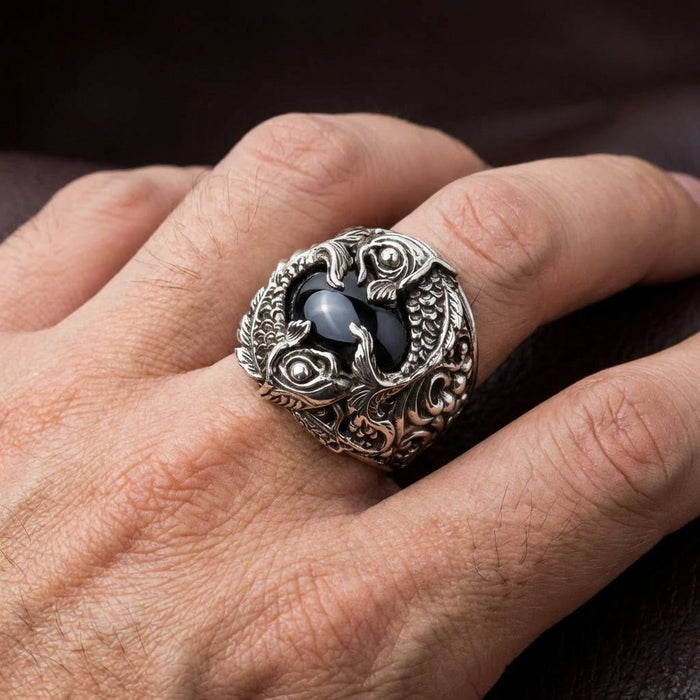 Sterling silver koi fish ring with black onyx worn on hand showing actual size and fit