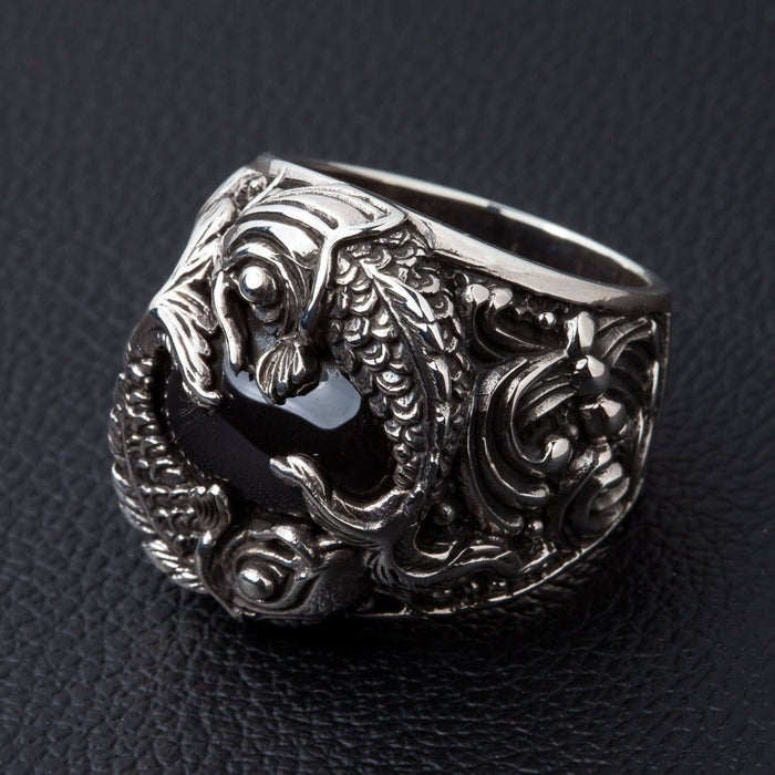 Profile view of handcrafted Japanese koi fish silver ring with intricate fin details