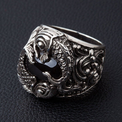 Profile view of handcrafted Japanese koi fish silver ring with intricate fin details