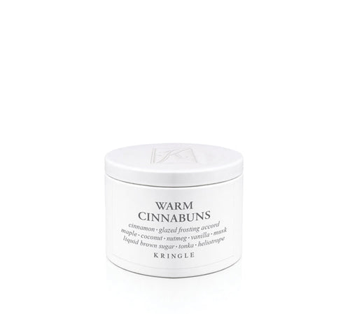 Kringle Creamery 'Warm Cinnabuns' candle tin on a white background