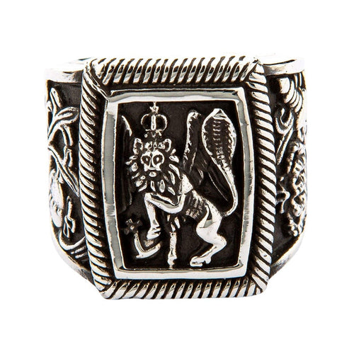 A solid sterling silver winged lion of St. Mark ring with a detailed crowned lion and ornate side details.