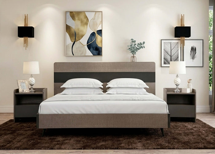 Low-profile bed with dark side tables and upholstered headboard