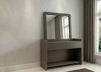 Dark gray dresser with open shelf and rectangular wall mirror